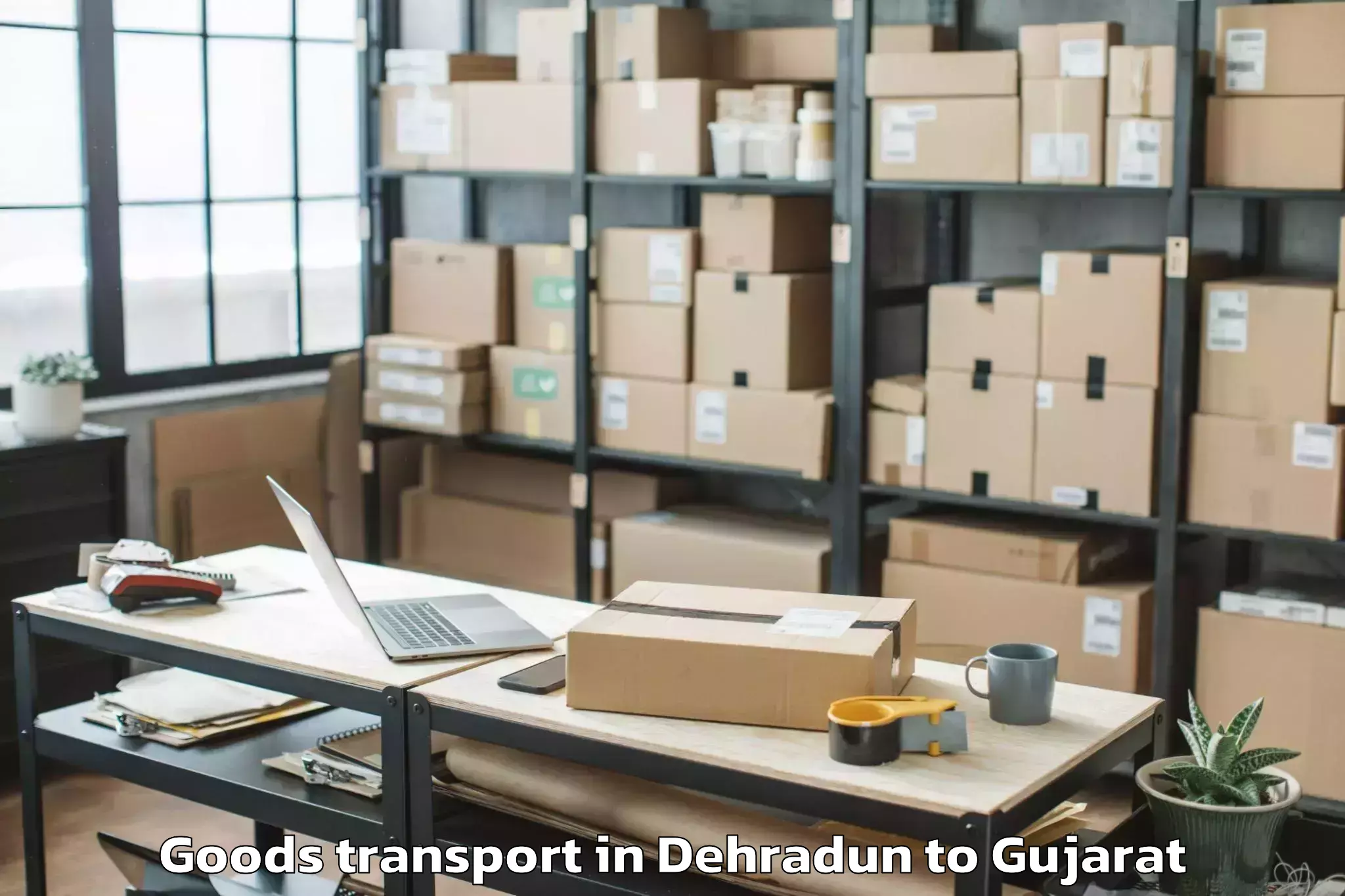 Discover Dehradun to Kotda Sangani Goods Transport